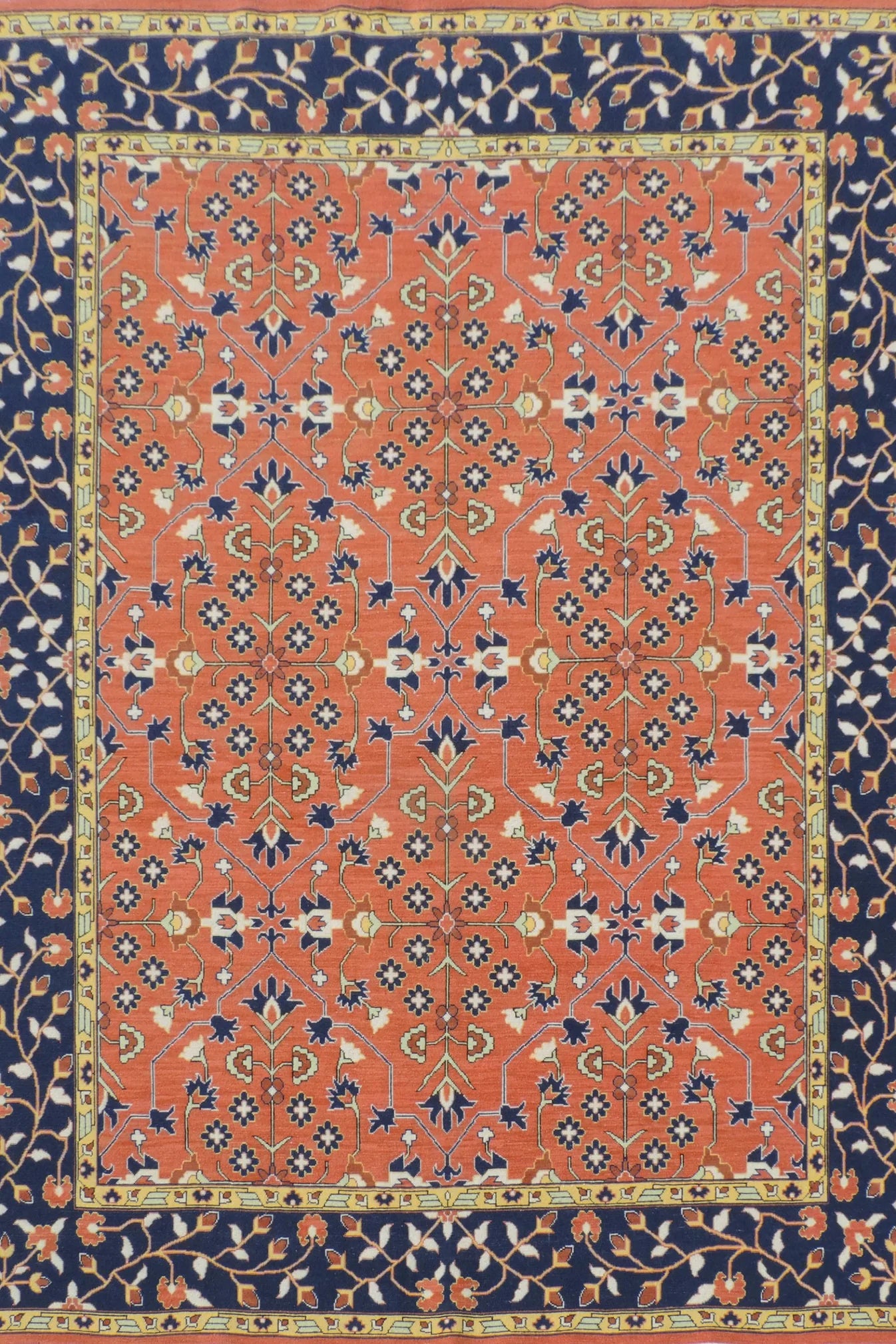 Decorative rug with intricate pattern on a red and blue background