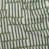 Gently draped printed linen in a broken stripe design in hunter green, sage green, ecru and cream. 