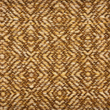 Handwoven rug sample in a radiating diamond pattern in shades of tan and brown. 