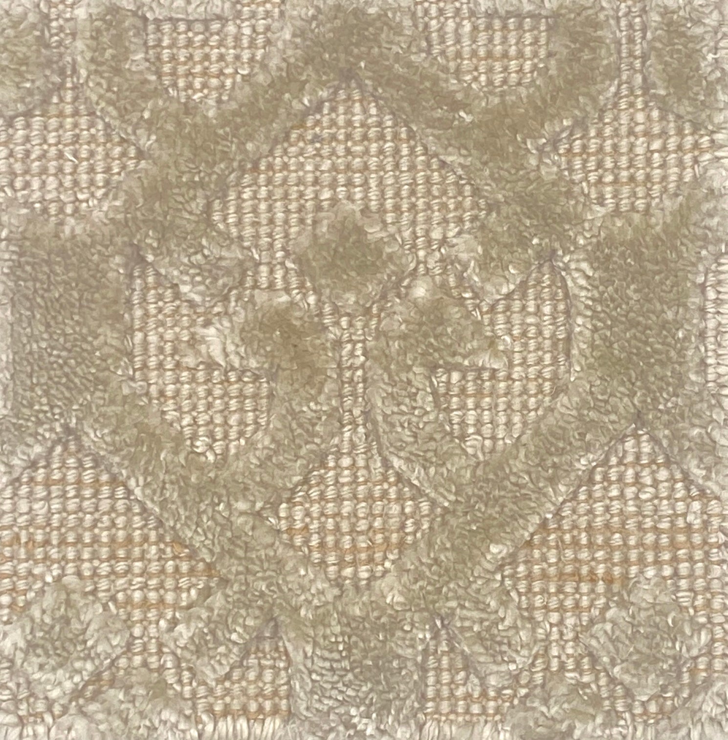 Close-up of textured rug with a subtle pattern