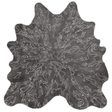 Detail of a cowhide rug in mottled gray with a white curvilinear overlay.