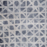 Close-up of cowhide upholstery leather in blue-gray with a white lattice overlay.