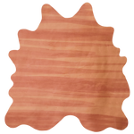 Detail of a cowhide rug in orange with an abstract stripe overlay in shades of orange and brown.