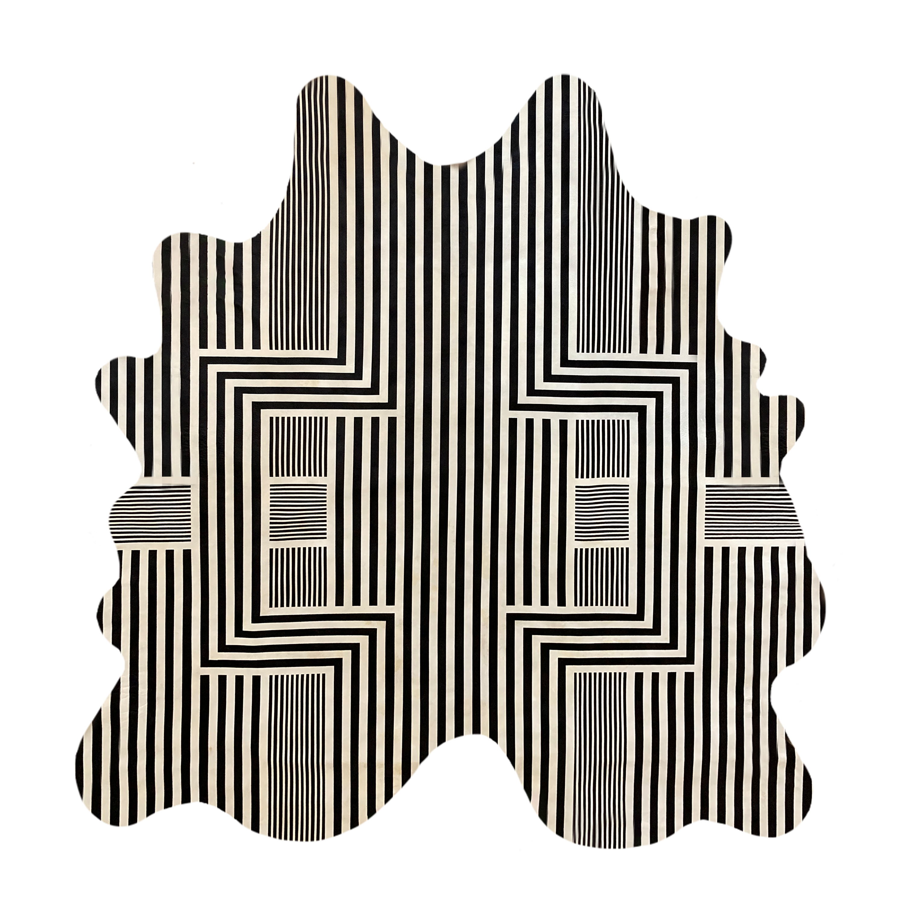 Detail of a cowhide rug in white with a geometric stripe overlay in black.