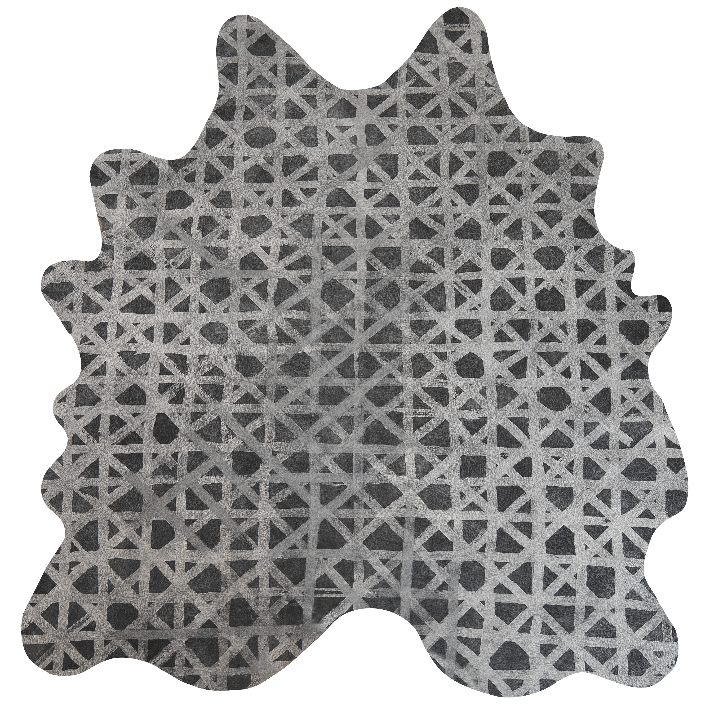 Detail of a large cowhide rug in gray with a white lattice overlay.