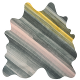 Detail of a cowhide rug in gray with an abstract stripe overlay in shades of gray, pink and yellow.