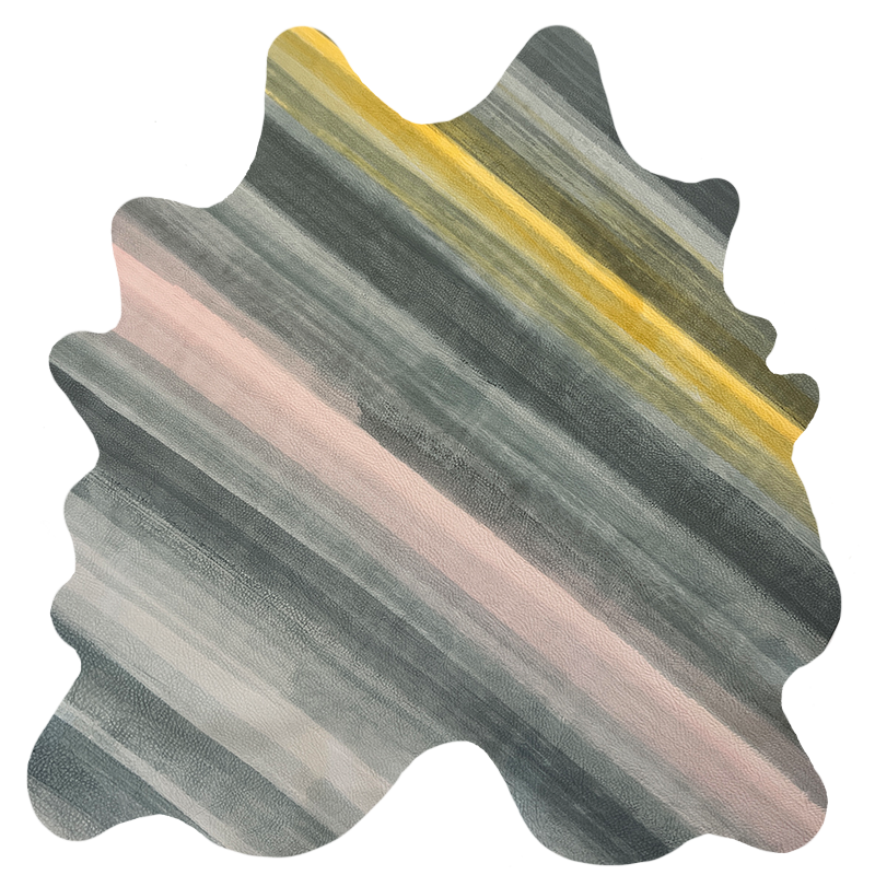 Detail of a cowhide rug in gray with an abstract stripe overlay in shades of gray, pink and yellow.