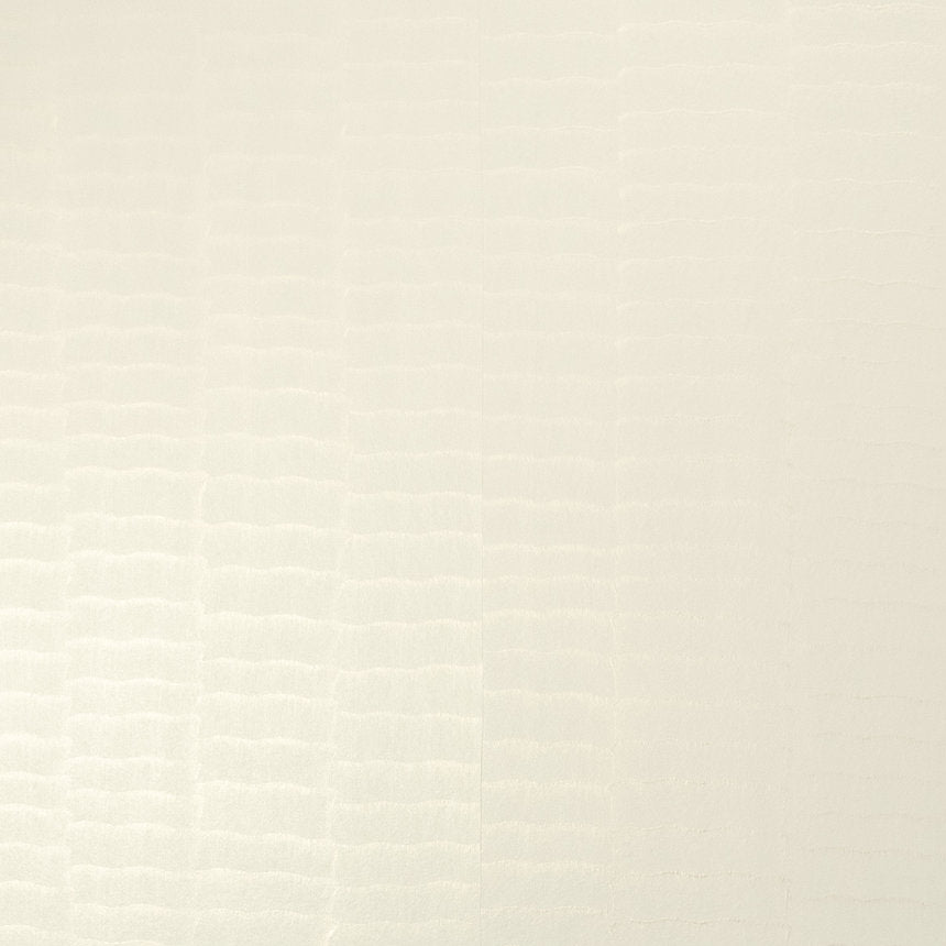 Detail of wallpaper in an abstract textural pattern in cream and metallic.