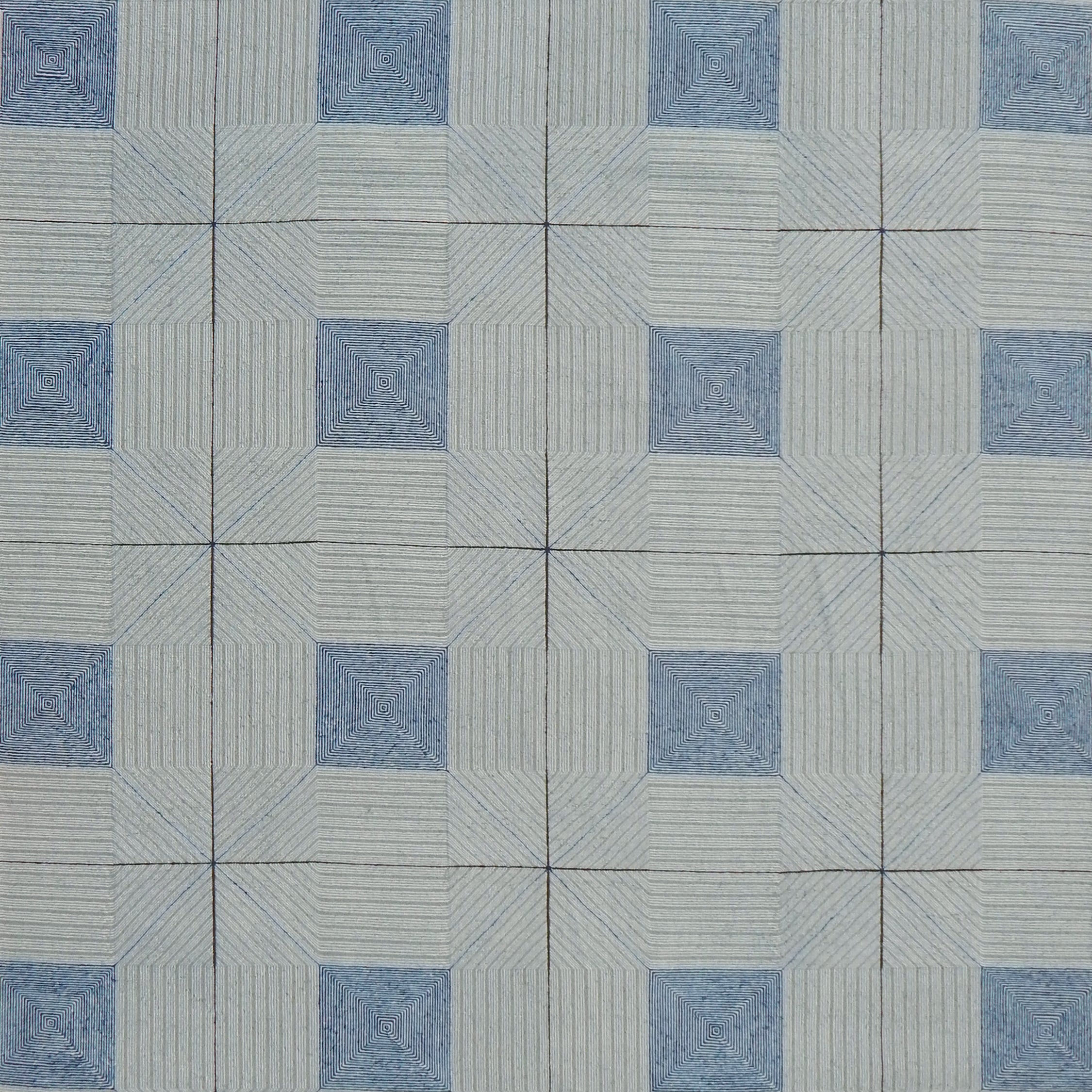 Patterned rug with blue and gray design