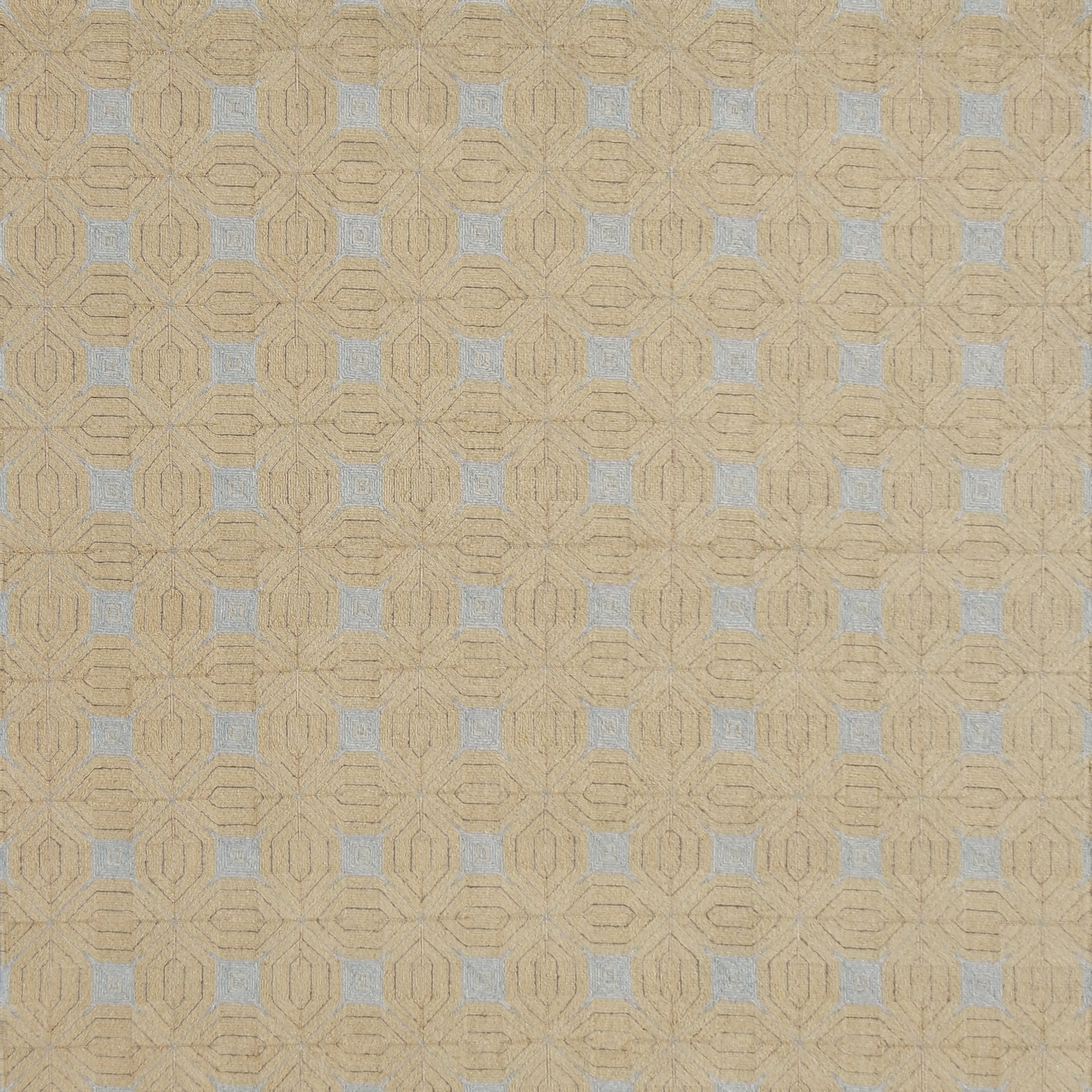 Patterned rug with geometric design on a beige background