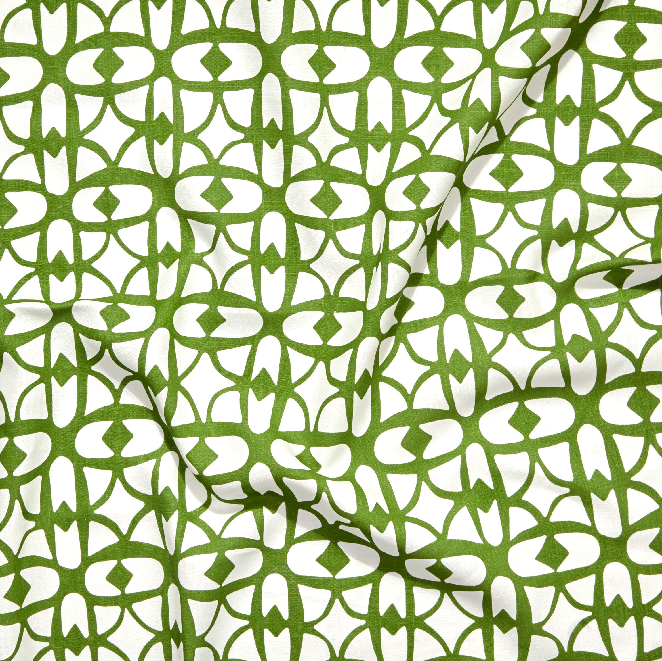 Close up of gently draped fabric with large scale geometric lattice design in white and green.  