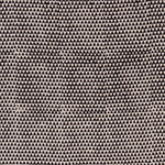Detail of fabric in a small-scale triangle print in black on a tan field.