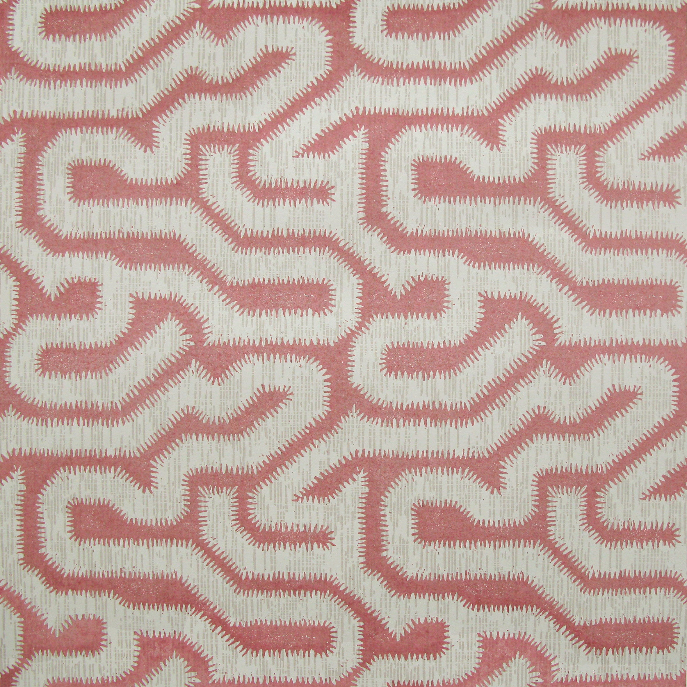 Detail of wallpaper in a playful meandering print in cream on a pink field.