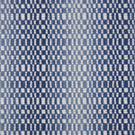 Broadloom carpet with a white checkerboard pattern with an ombré effect in shades of blue.