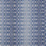 Broadloom carpet with a white checkerboard pattern with an ombré effect in shades of blue.