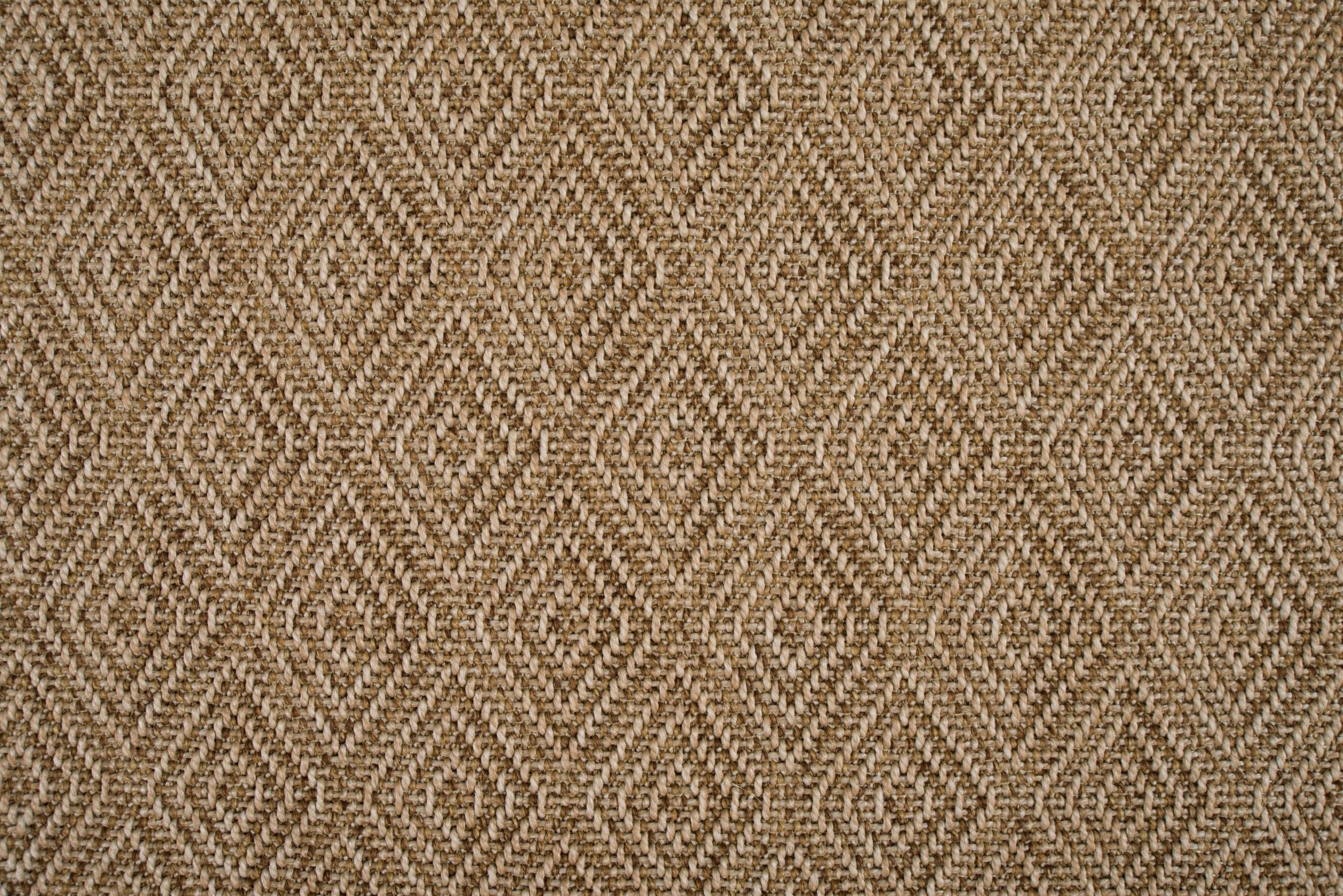 Broadloom carpet in a raised diamond pattern in camel. 
