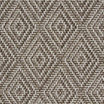Broadloom carpet in a raised diamond pattern in taupe.