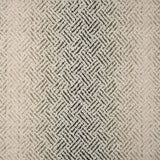 Broadloom with a geometric pattern on an ombré background in cream and emerald green.