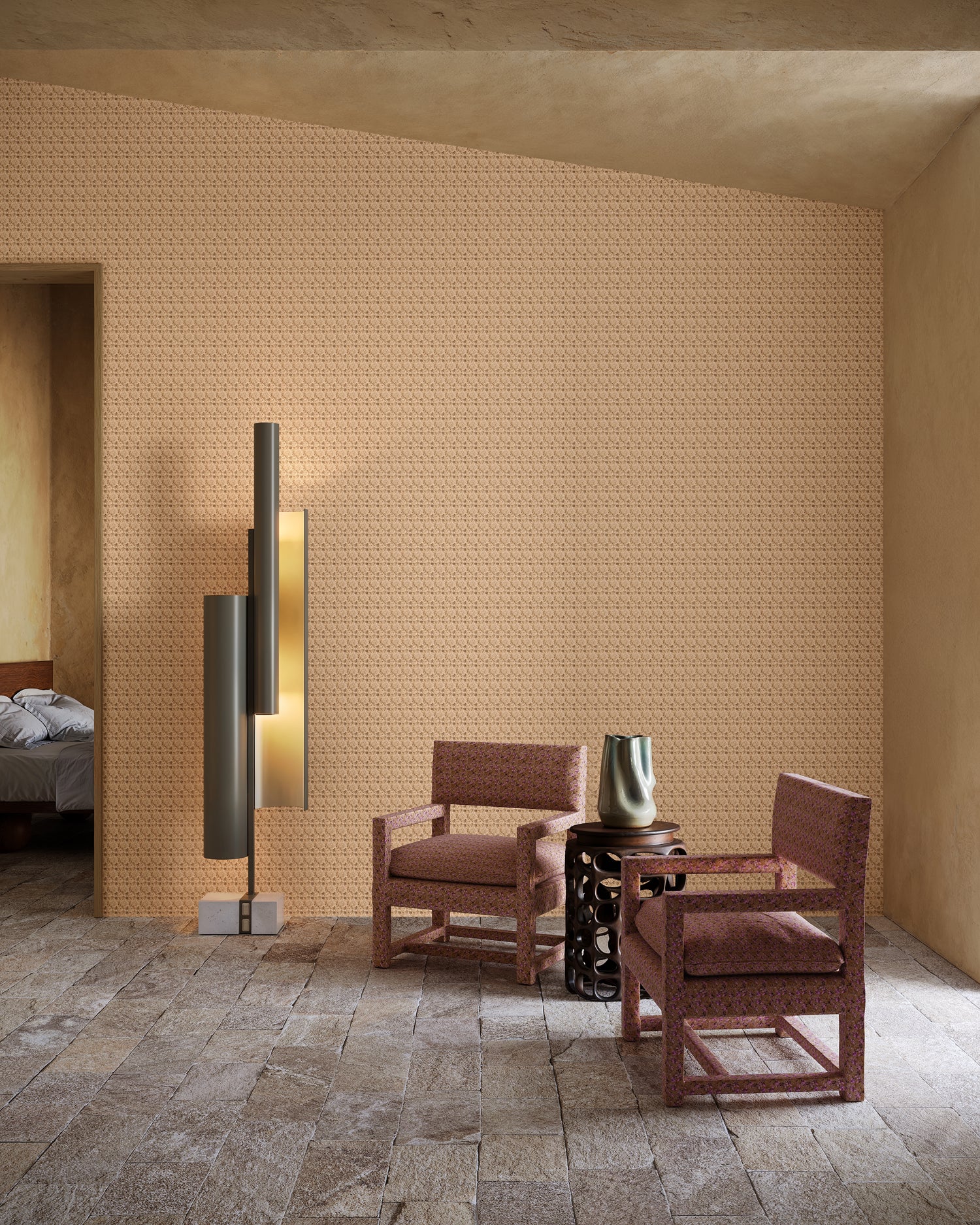 Modern interior with two brown chairs, a floor lamp, and a side table against a textured beige wall.