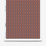 Wallpaper roll with small scale watercolor floral in blue and orange.
