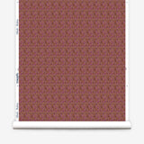 Wallpaper roll with small scale watercolor floral in purple and brown.