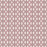 Detail of wallpaper in an intricate lattice print in pink on a cream field.