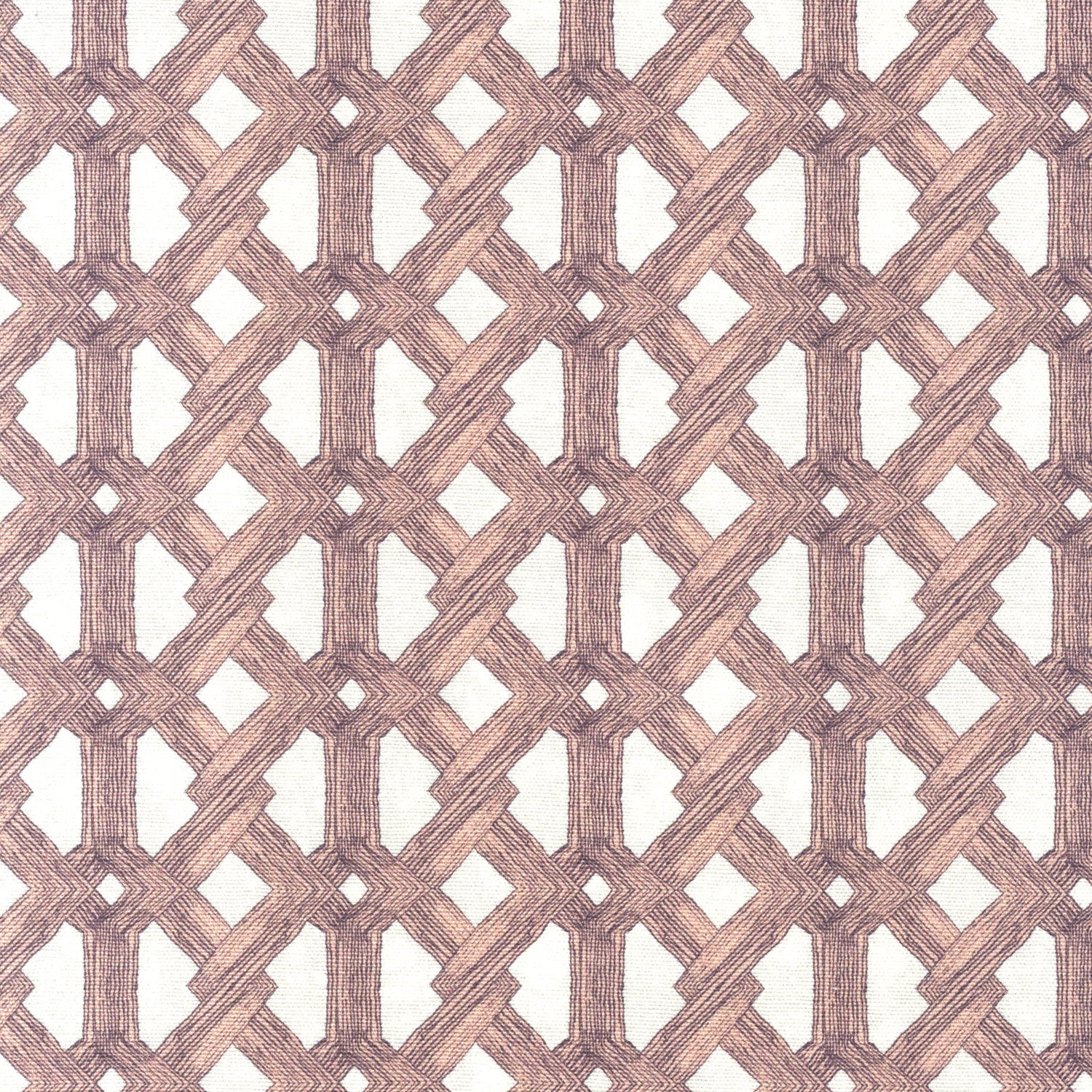 Detail of fabric in an intricate lattice print in light pink on a cream field.