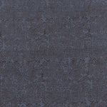 Detail of fabric in a dense paisley print in brown on a navy field.