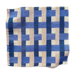 Square fabric swatch in an interlocking checked pattern in shades of tan, blue and navy.