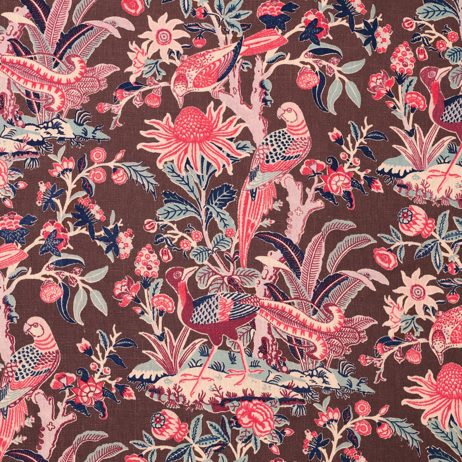 Printed fabric with a lush botanical motif with exotic birds in pink, blue and white on a brown field. 