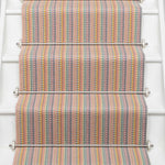 Striped flatweave runner in tan blue green on white staircase