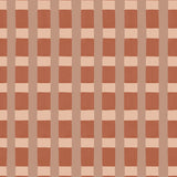 A wallpaper pattern detail in a gridded check pattern in warm pink hues. 