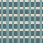 A fabric pattern detail in a gridded check pattern in cream and turqoise blue. 