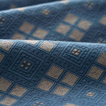Close-up of blue fabric with geometric pattern