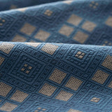 Close-up of blue fabric with geometric pattern