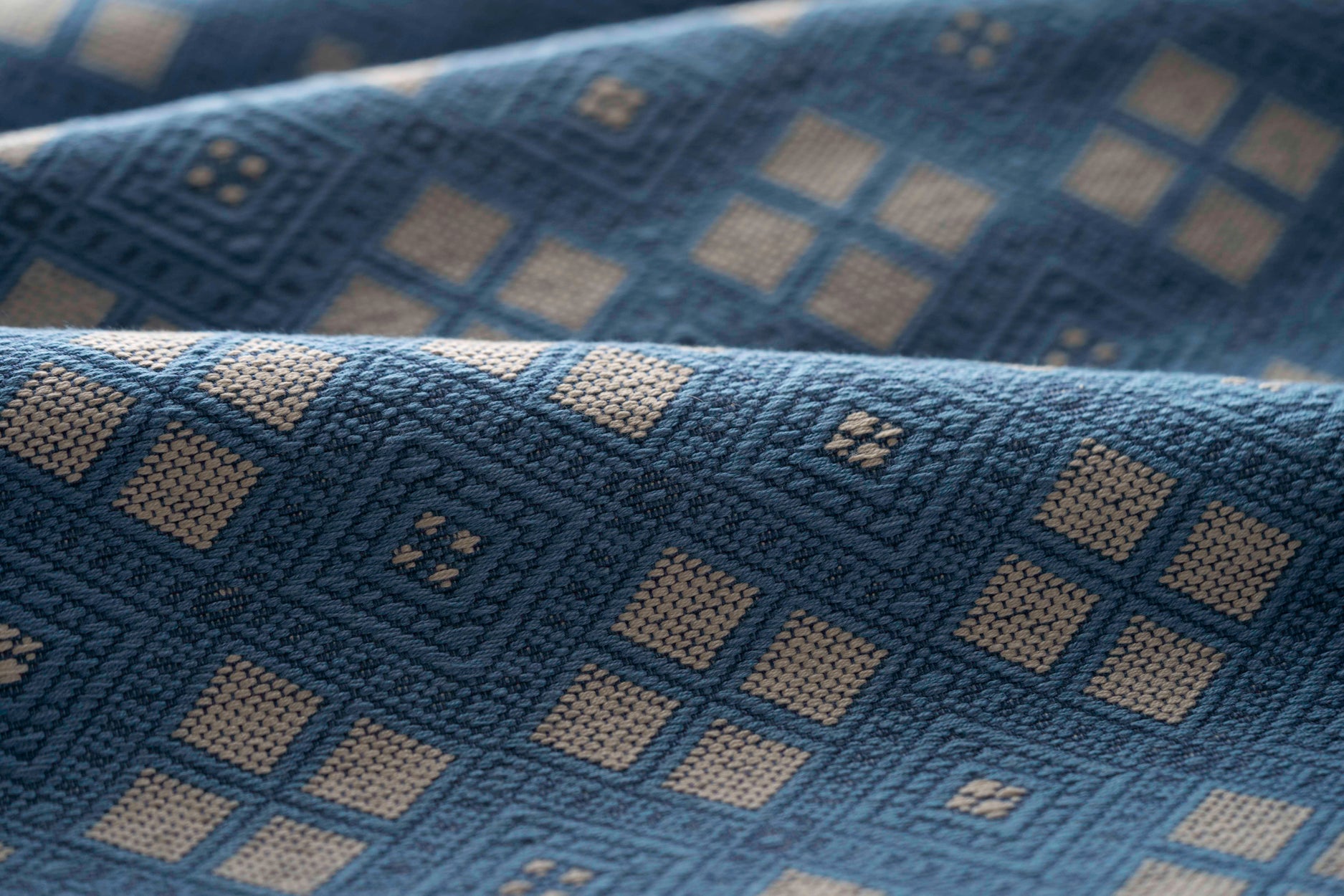 Close-up of blue fabric with geometric pattern