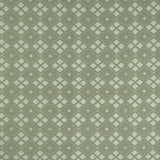 Woven fabric with ornate diamond design in shades of green. 