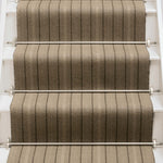 Striped flatweave runner in tan and brown on white staircase