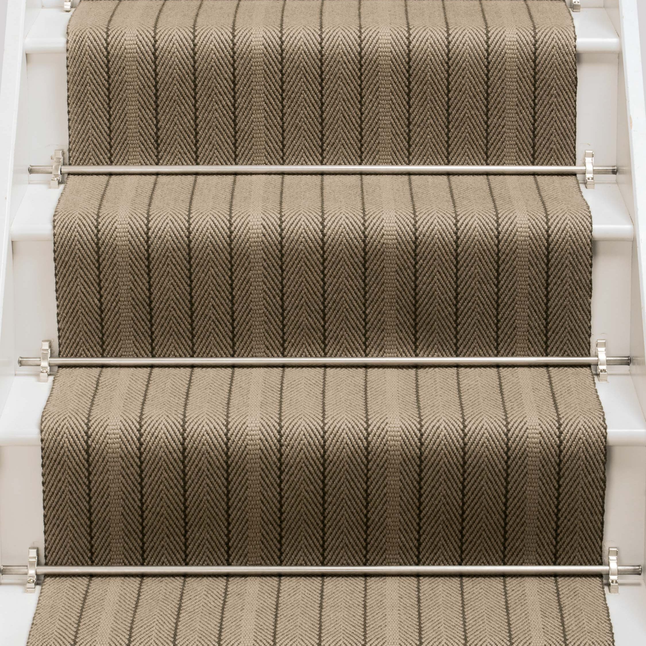 Striped flatweave runner in tan and brown on white staircase