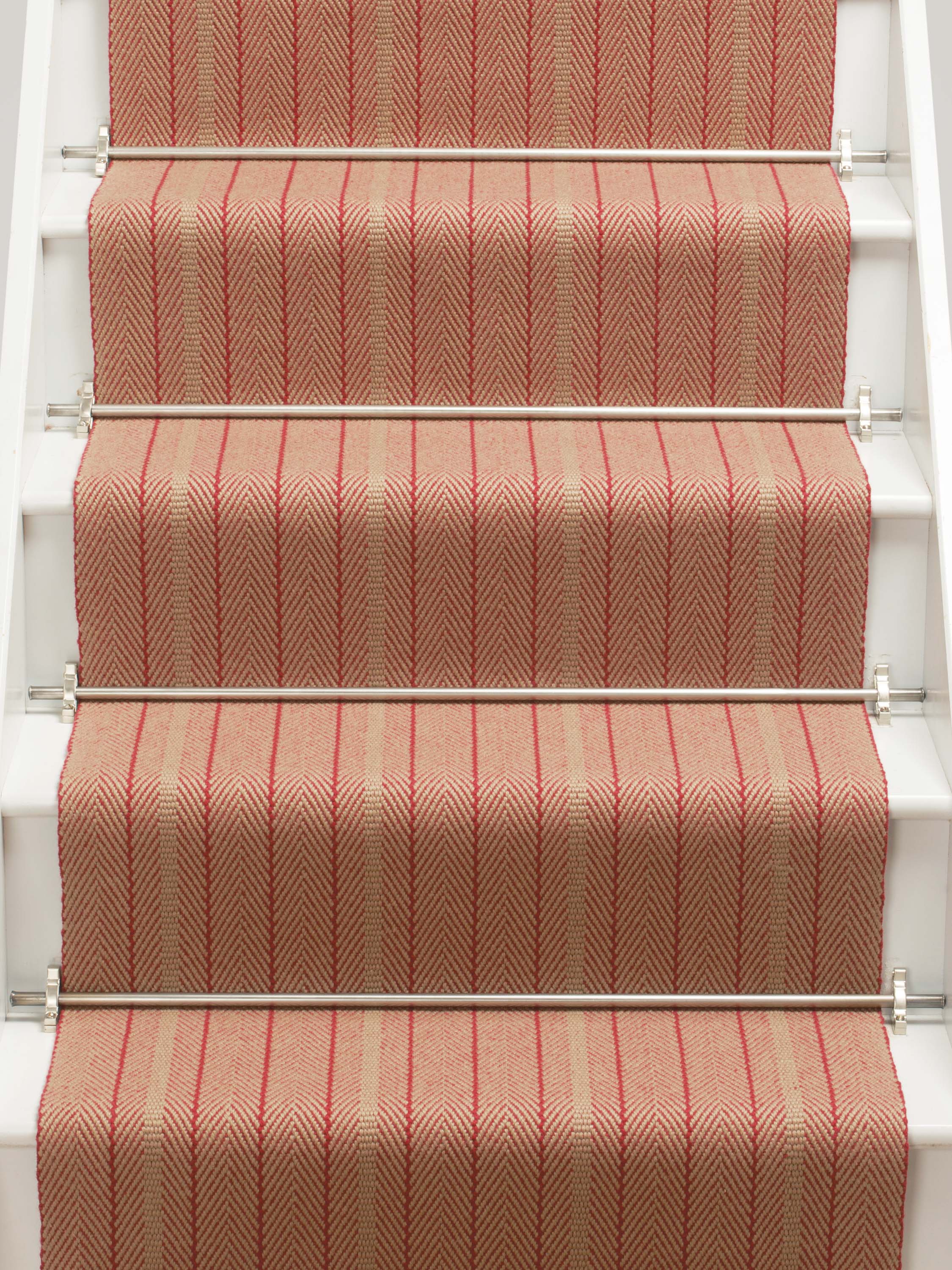 Striped flatweave runner in raspberry and red on white staircase
