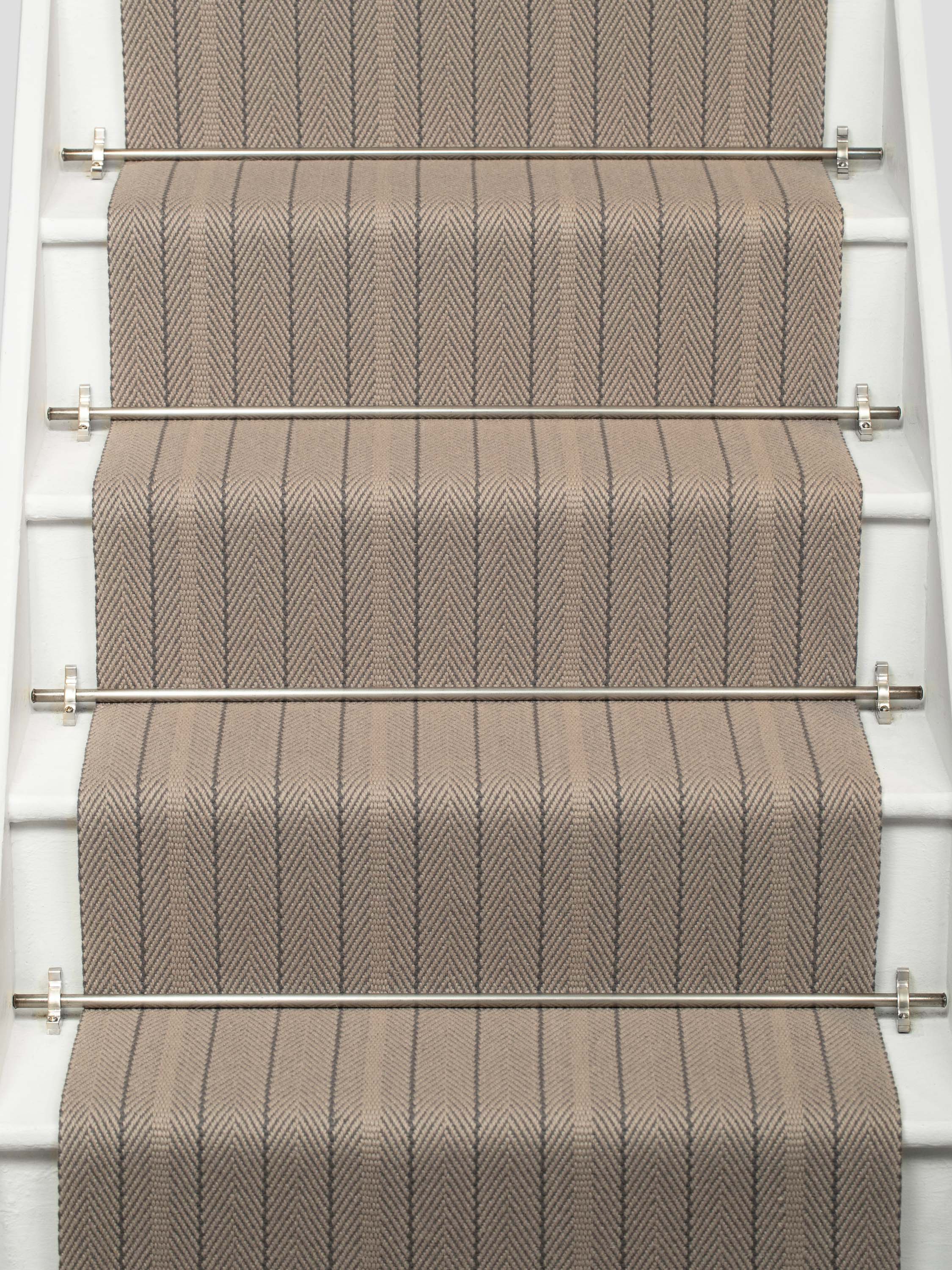 Striped flatweave runner in grey on white staircase