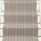 Striped flatweave runner in light grey on white staircase