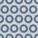 Pattern of circular shapes on a light blue background