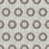 Detail of wallpaper in an intricate circular print in shades of green, red and gray.