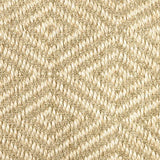 Close-up of a textured natural fibre woven diamond pattern rug in beige. 