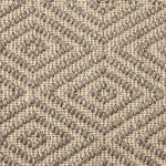 Close-up of a textured natural fibre woven diamond pattern rug in taupe. 
