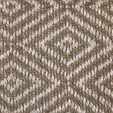Close-up of a textured natural fibre woven diamond pattern rug in brown.