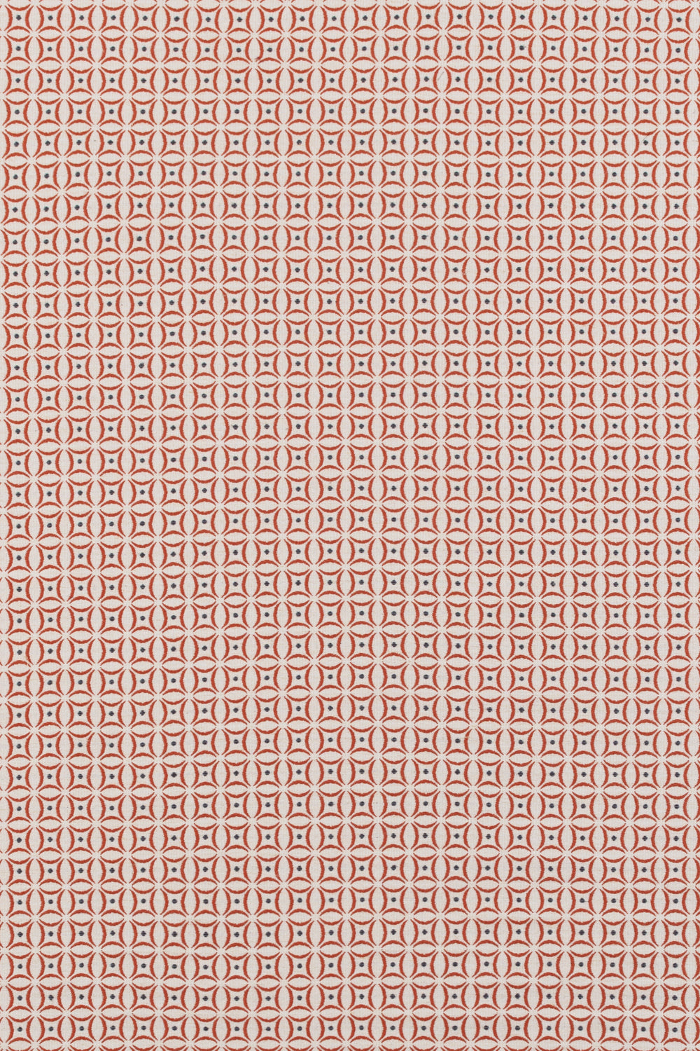 Woven fabric in a geometric grid print in red and navy on a cream field.