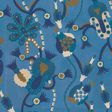 Detail of a playful graphic botanical design  in shades of blue and brown on a bright blue field.