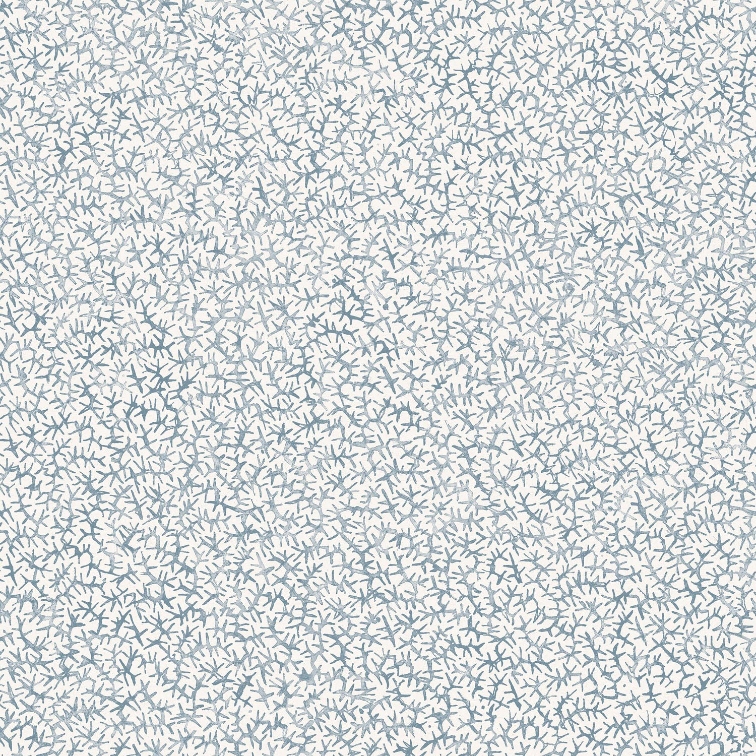 Printed fabric with small scale coral design in light blue on white. 
